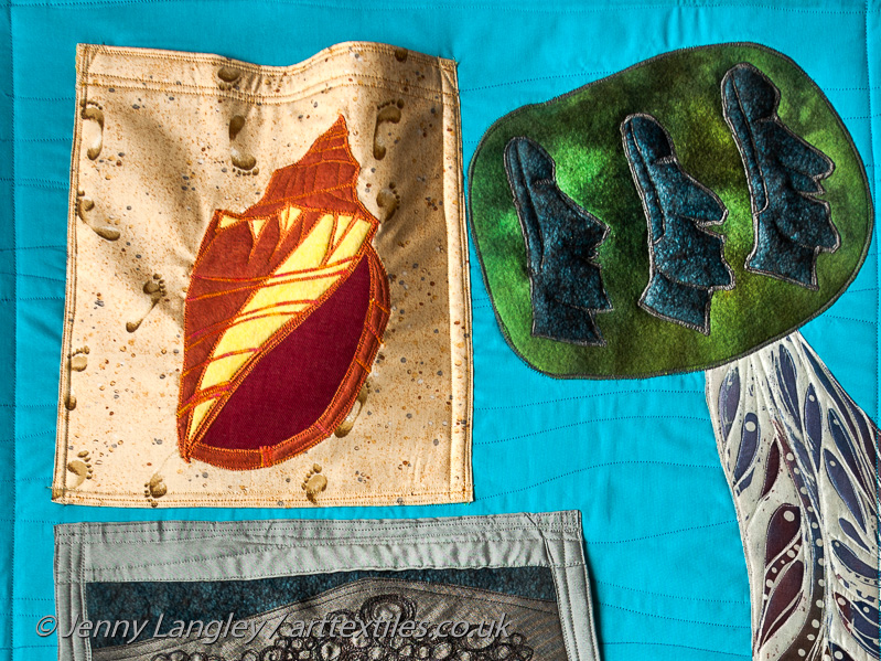 Shell pocket and Easter Island statues.