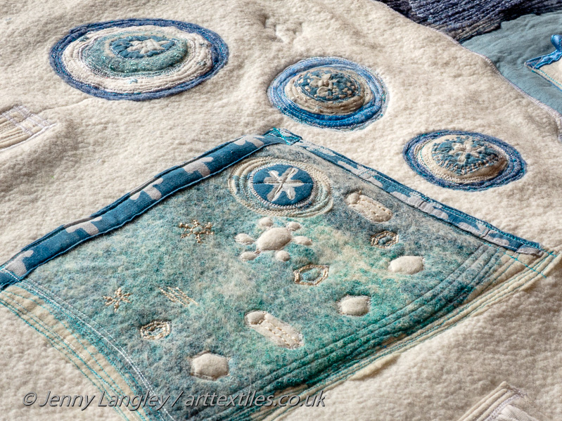 Pocket for snow gauge, showing different forms of snow.