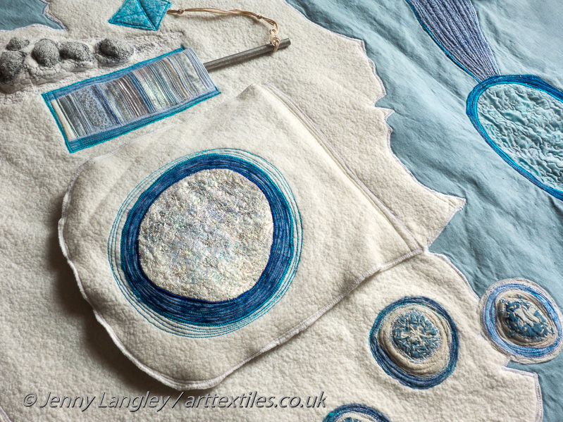 Large flap with ice crystals covering a tropical Antarctica of 50 million years ago.  Borehole with icecore - including layers containing ancient gas bubbles.