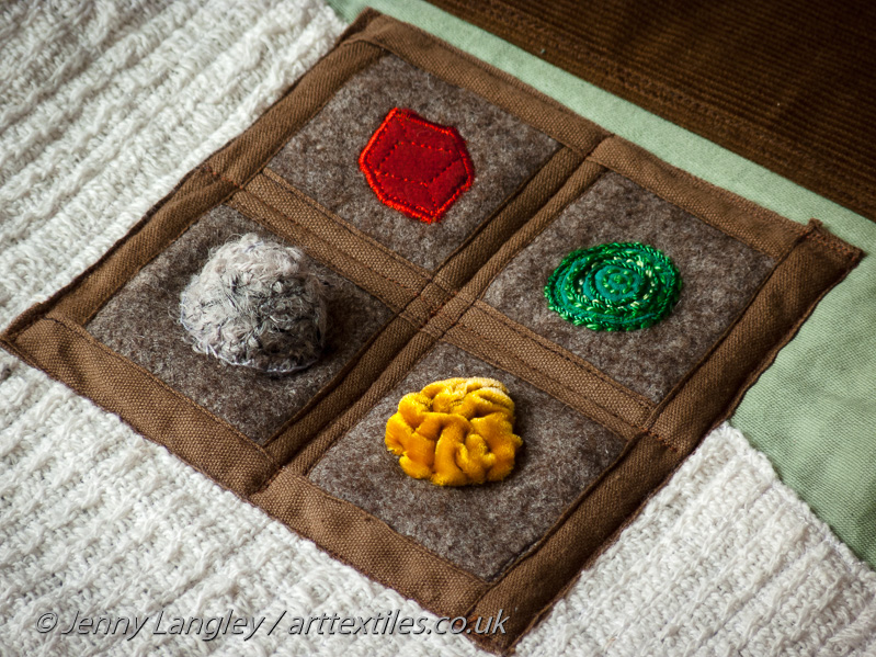 The Beaney Museum's mini- collector's box with garnet, malachite, Klondike gold and Vesuvius ash.