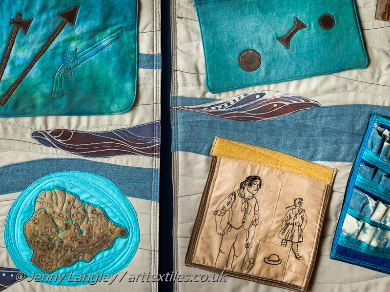 Flaps with weapons and ordinary 18th Century sailors.  Map of Ascension Island, where Dampier was shipwrecked. Patches with sea and fish fabric, which is used throughout the mat.