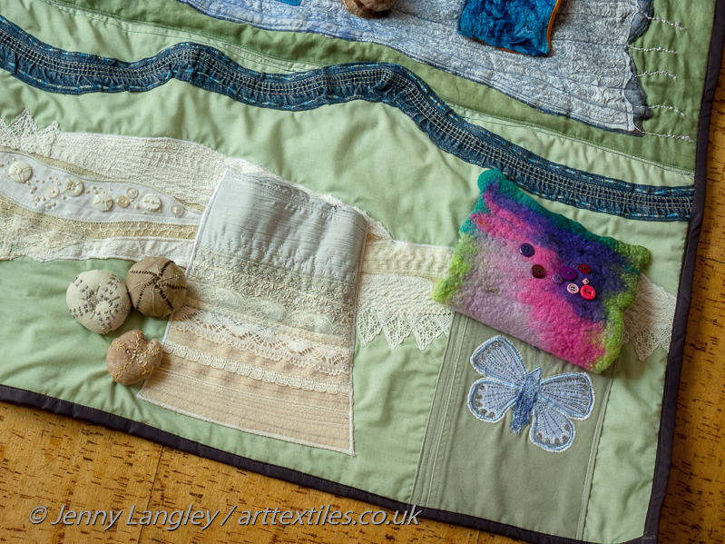 Flap lifted up to reveal a Chalkhill Blue butterfly which only lives on chalk soil.  Again, a brightly coloured flap lining to surprise the user.