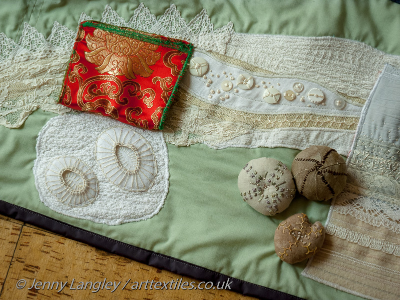 Chalk consists of plates of calcium carbonate called coccoliths which were made by algae.  The flap's lining refers to the Chinese Bridge in the garden.